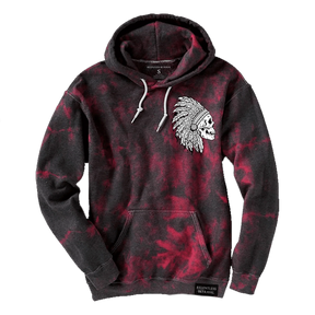 The Youth Trustless Chief Tie Dye Hoodie by Relentless Betrayal features black and red tie-dye, a white Native American chief head graphic on the left chest, white drawstrings, a front pocket, and a branded label near the hem.