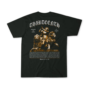 The 13th Mighty To Save Premium Tee is a black shirt with Daniel and two lions, THIRTEENTH at the top, Daniel 6:19-23 and biblical references in gothic-style font.