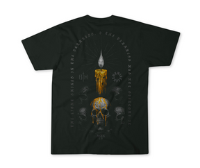 The 13th Victorious Dawn Premium Tee features a bold lit candle over a detailed skull, surrounded by faded skulls. Encircling text reads: The light shines in the darkness, & the darkness has not overcome it—symbolizing spiritual strength.