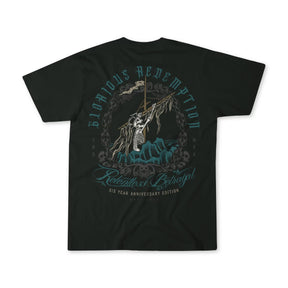 Dark green tee from Relentless Betrayals Glorious Redemption Premium line features a skeleton with a sword on rocks, surrounded by Glorious Redemption & Relentless Betrayal, Six Year Anniversary Edition, ornate detailing, and ROR and MRR lettering.