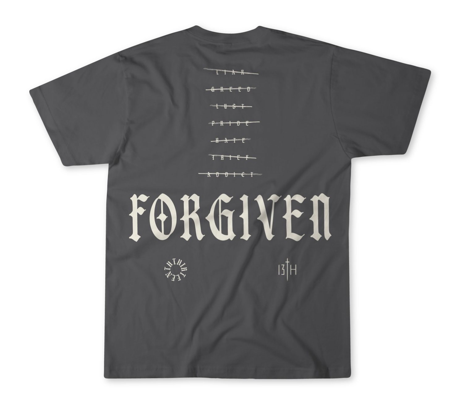 The Forgiven Premium Tee by 13th features "FORGIVEN" in bold Gothic font on the back, a barbed wire graphic above, and small symbols below—including a circular design, "13TH" initials, and subtle references to overcoming addiction or lying.