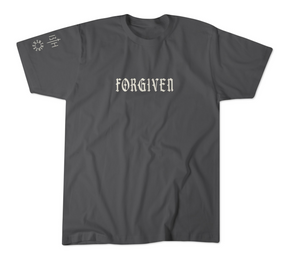 The 13th Forgiven Premium Tee is a dark gray shirt with "FORGIVEN" in white Gothic letters on the chest and a small white graphic on the left sleeve, highlighting that anyone—liar or addict—can be forgiven.