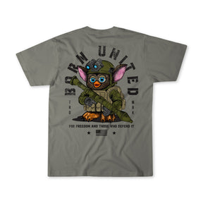 A gray Furbinator T-shirt by Born United Private Label shows a Tactical Furby in military gear holding a rifle, with Born United above and For freedom and those who defend it below.