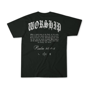 The Worship Premium Tee by 13th features WORSHIP in bold Gothic white letters on a black shirt, with Psalm 98:4-6 and small logos printed beneath on the back.