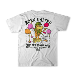 The Speak For The Free! Tee by Born United Private Label is a white shirt with a Dr. Seuss-style character in a helmet amid colorful trees. Text: BORN UNITED FOR FREEDOM AND THOSE WHO DEFEND IT and I speak for the free!.