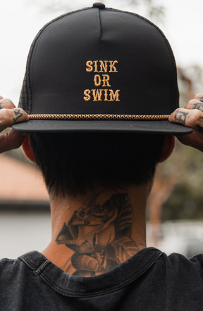 relentless betrayal - sink or swim blackout snapback on model