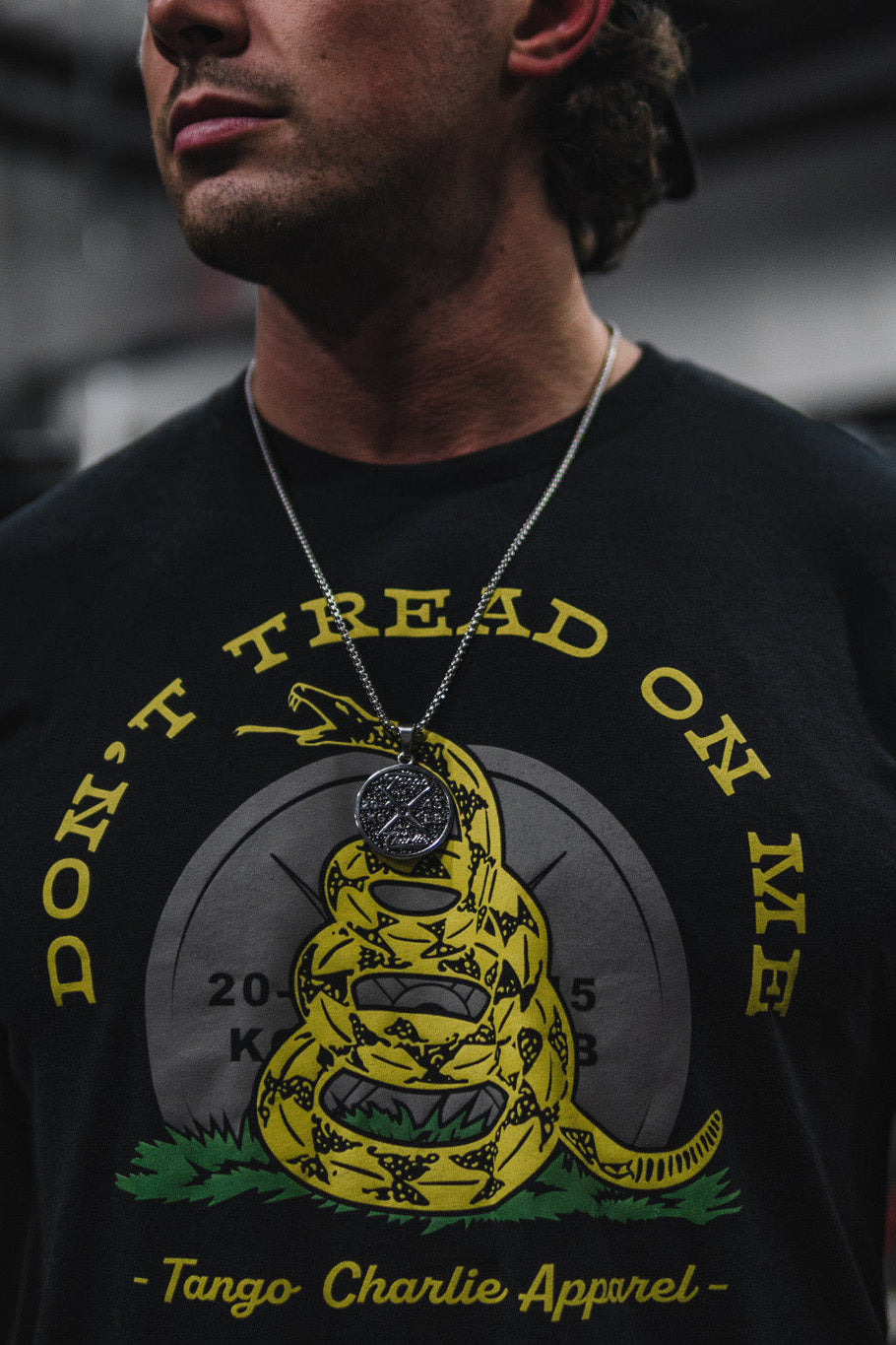 tango charlie - gadsden flag t-shirt on male model