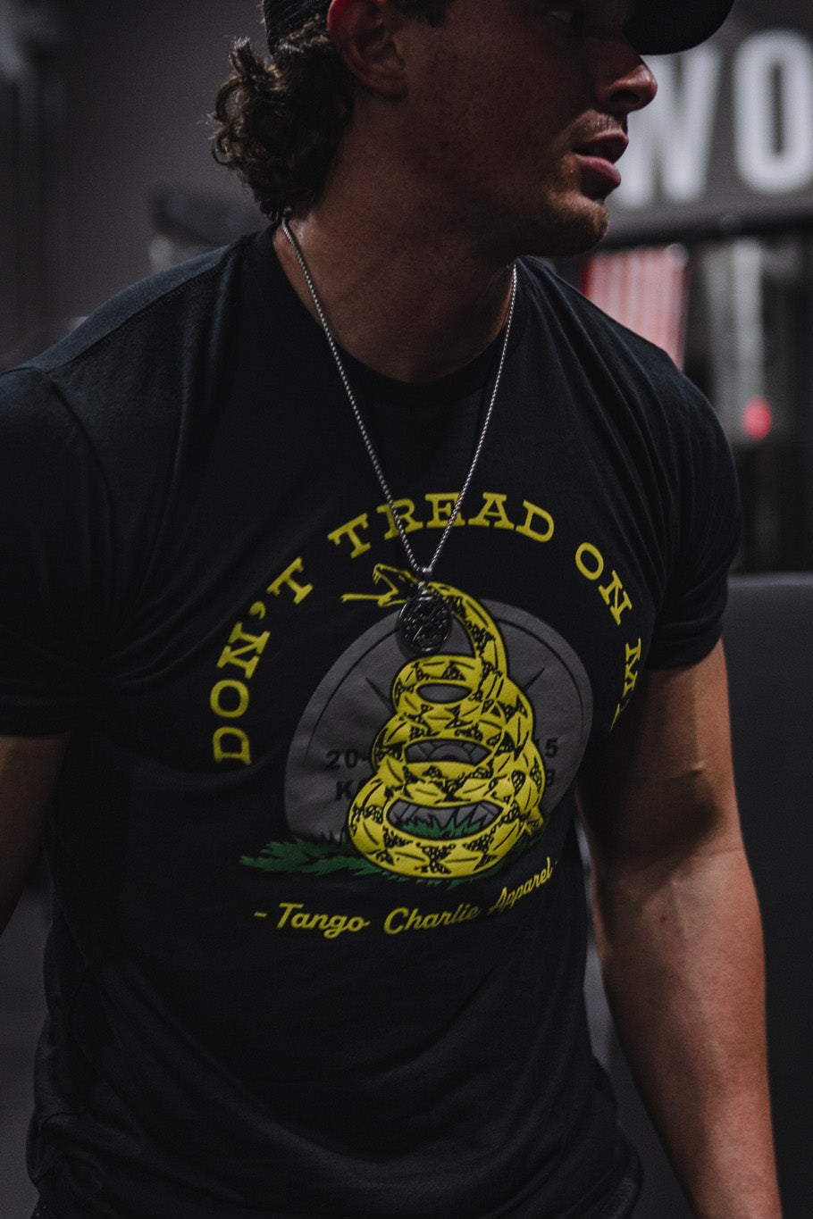 tango charlie - unisex gadsden flag t-shirt on model