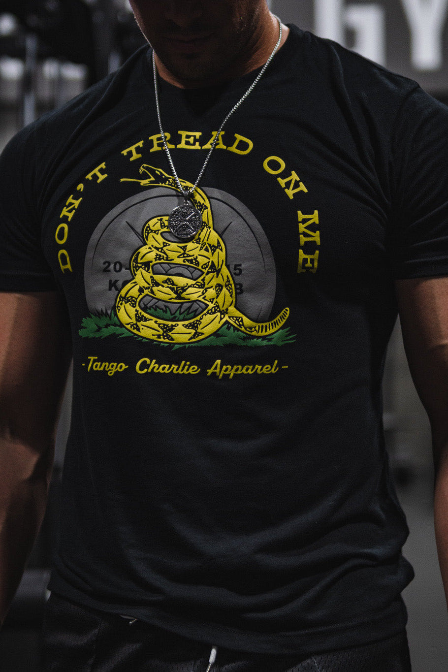 tango charlie - don't tread on me t-shirt on male model