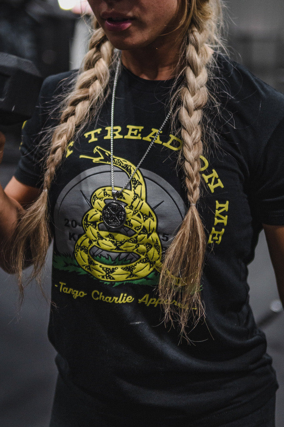 tango charlie - don't tread on me t-shirt on female model